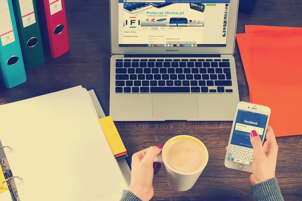 laptop, iphone, workspace, hands, coffee, binders, facebook, social media, social networking, working, notebook, desk, work, office, business, macbook, connecti