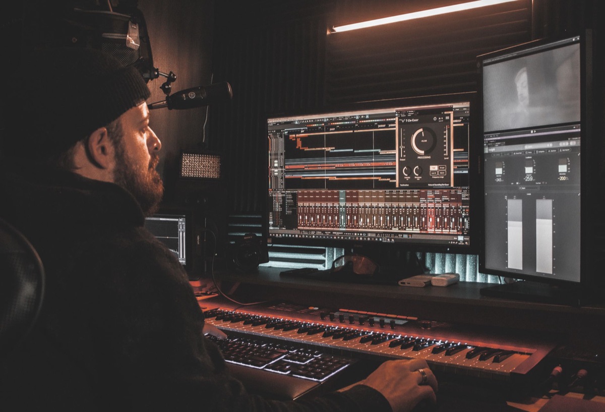 Spanish music producer in home studio