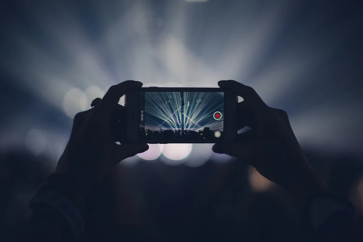 iphone, concert, lights, stage lights, record, video, recording, video recording, capture, apple product, hands, audience, event, live event, live performance,
